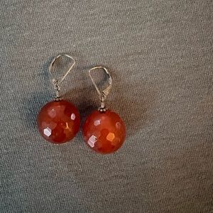 Rust/orange “disco ball” earrings. David Aubrey.
